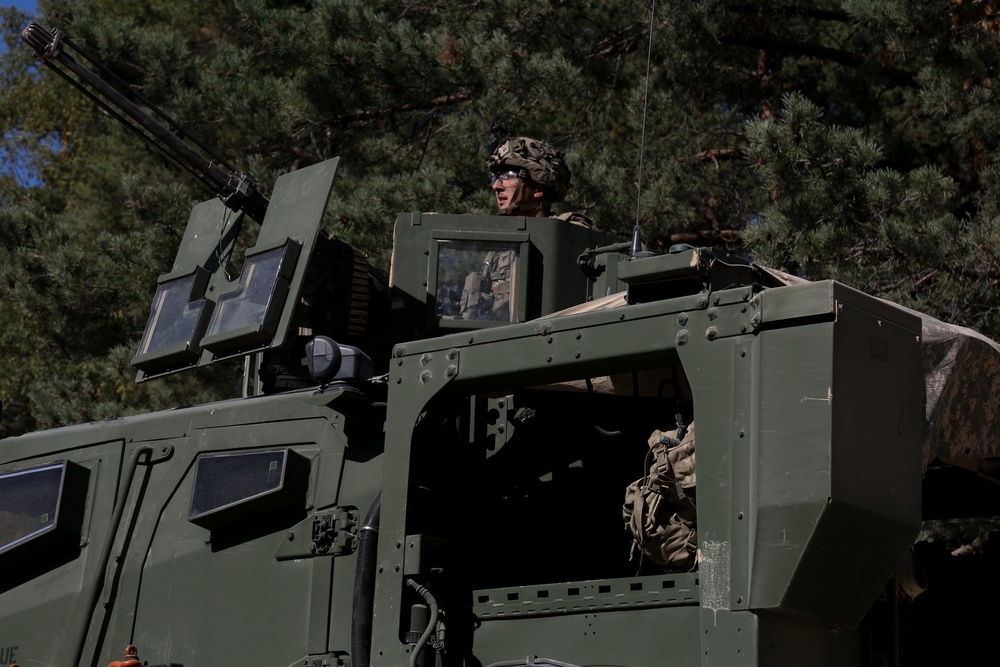 U.S. Soldiers of the 173rd Airborne Brigade hold a battle position during Saber Junction 19