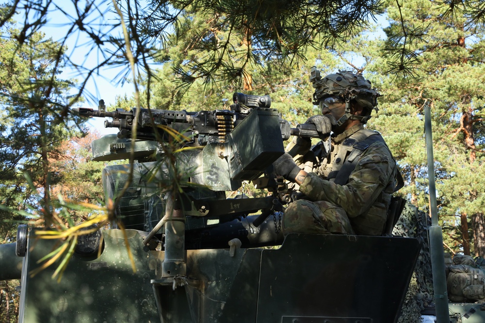 A U.S. Soldier scan his sectors of fire during Saber Junction 19