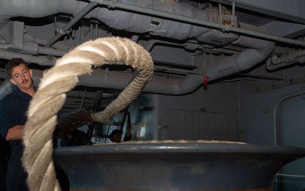 A Sailor heaves line