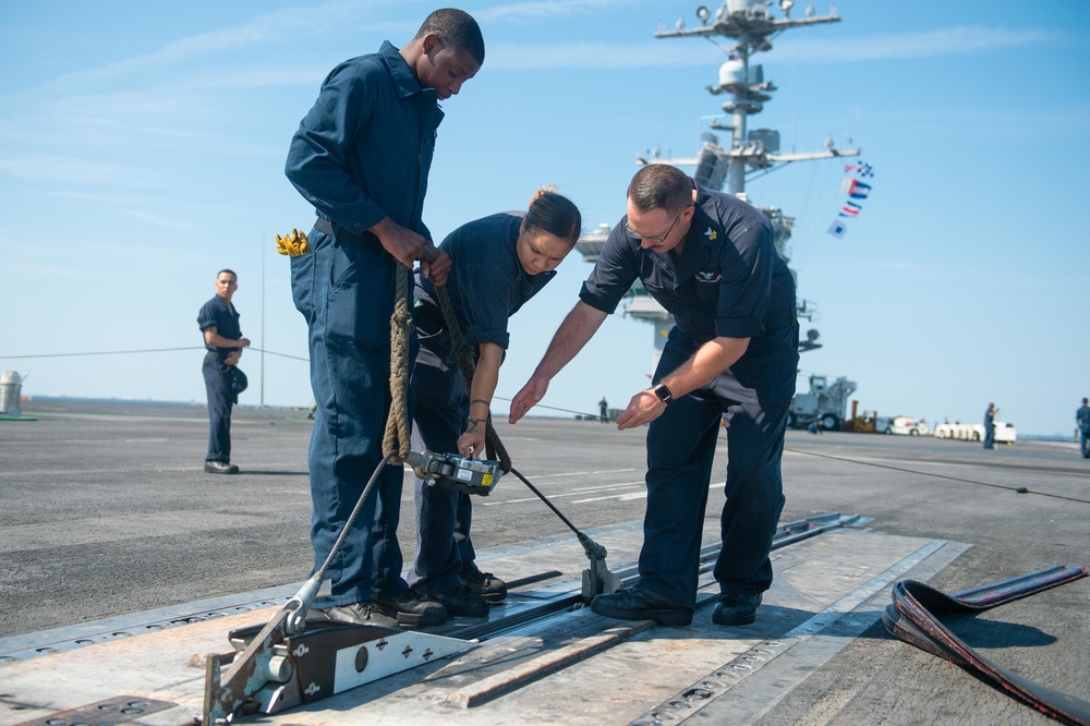 Sailors conduct maintenance