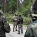 Ukraine soldiers negotiate road barricade during RT19 FTX
