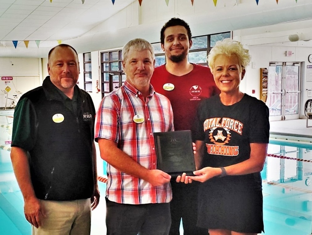 Swim team recognizes Rumpel Fitness Center staff at Fort McCoy