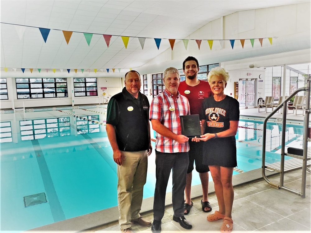 Swim team recognizes Rumpel Fitness Center staff at Fort McCoy