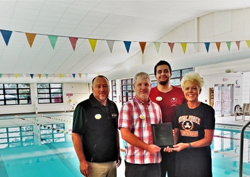 Photo Essay: Swim team recognizes Rumpel Fitness Center staff at Fort McCoy