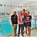 Swim team recognizes Rumpel Fitness Center staff at Fort McCoy