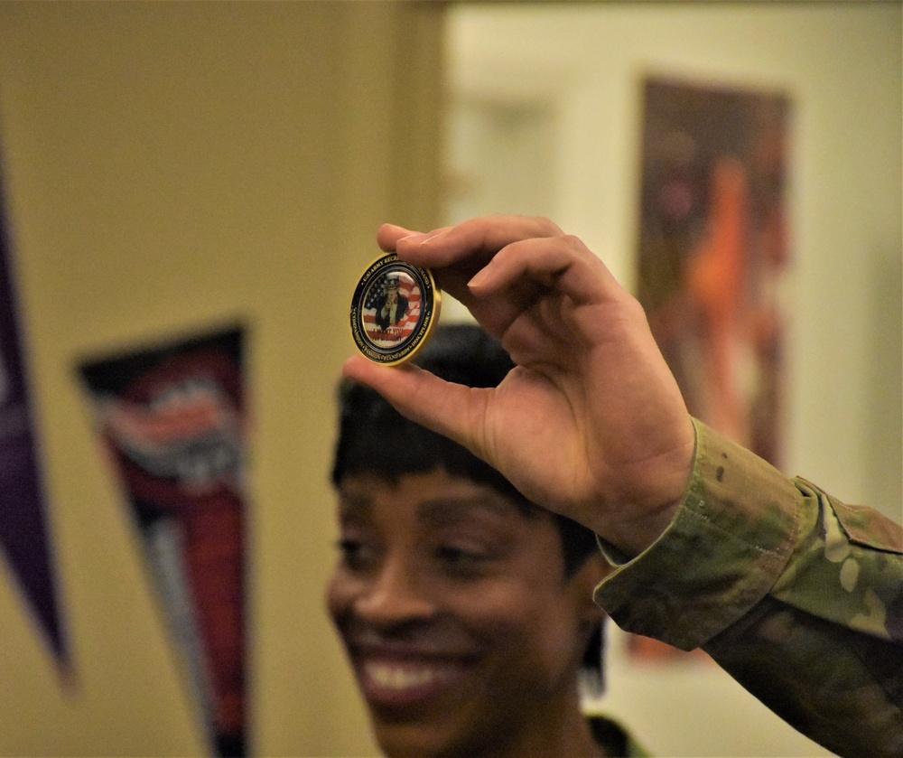 CSM Gavia presents challenge coin for recruiting excellence