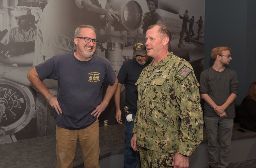 USS Gettysburg (CG-64) Commanding Officer meets with staff members at Naval Museum