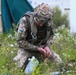 A Ukrainian soldier loads ammo during Saber Junction 19