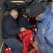 USS Normandy Sailors Conduct Maintenance Checks on Life Preservers