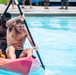 Marines paddle toward victory during CG’s cup event.