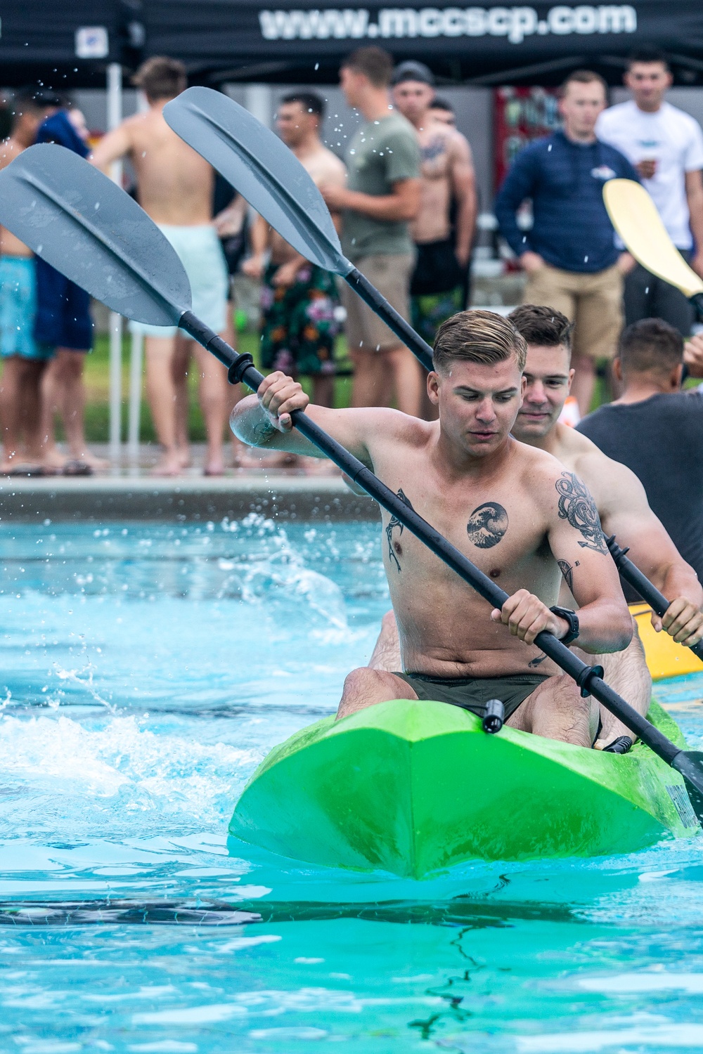 Marines paddle toward victory during CG’s cup event.