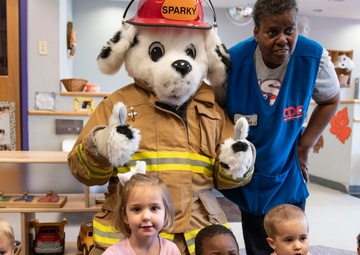 Sparky Helps Promote Fire Prevention to Military Children