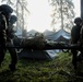 U.S. Soldiers litter carry a casualty during Saber Junction 19