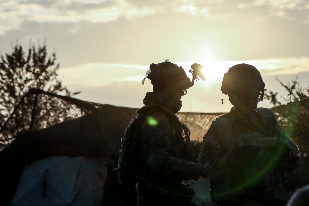 U.S Soldiers read a medical card during Saber Junction 19