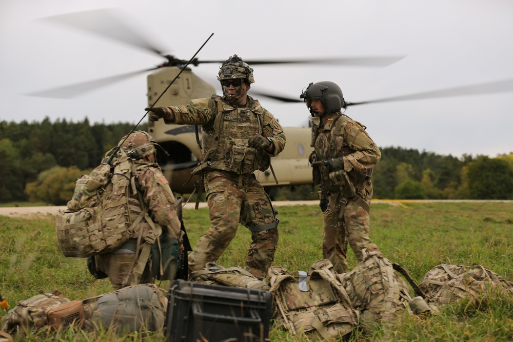 U.S. Soldiers prepare for a vehicle airlift during Saber Junction 19