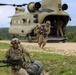 U.S. Soldiers dismount from CH-47 Chinook helicopter during  Saber Junction 19