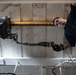 U.S. Sailor operates a hoist