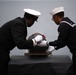 U.S. Sailors conduct a burial at sea aboard the aircraft carrier USS John C. Stennis (CVN 74)