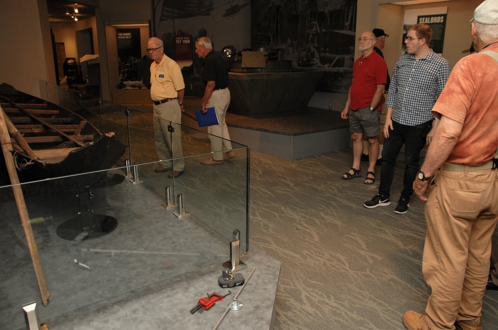 Museum volunteers tour new exhibit spaces