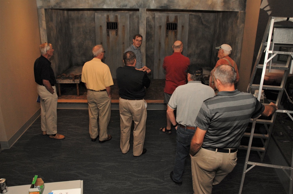 Museum volunteers tour new exhibit spaces