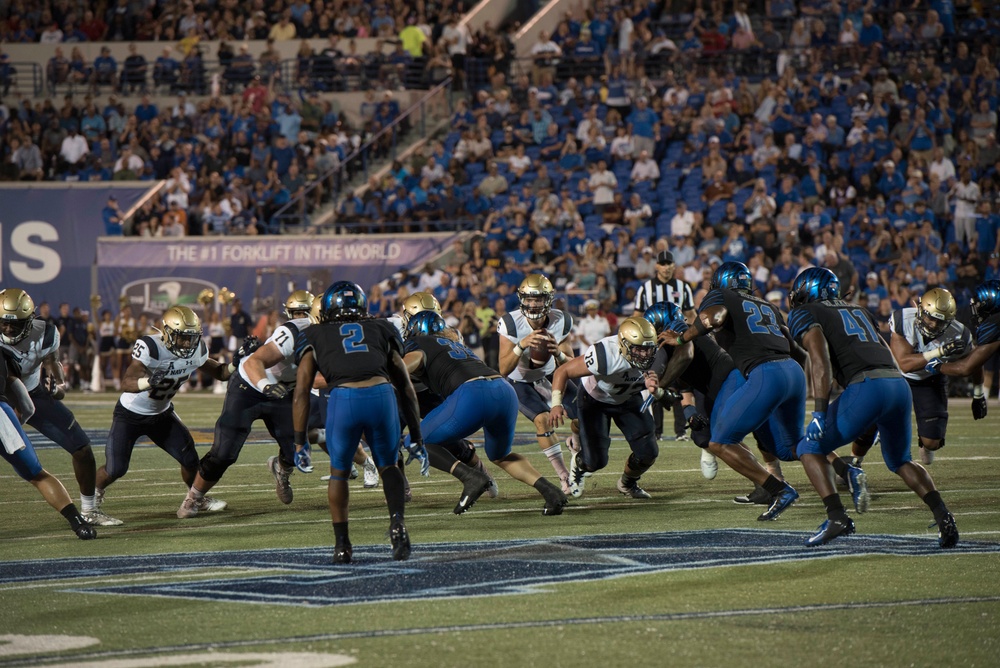 U.S. Air Force recruits are sworn in during halftime on Salute to Service  military appreciation day at an NFL football game between the Jacksonville  Jaguars and the Las Vegas Raiders, Sunday, Nov.