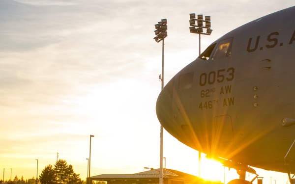 Last Sliver of Sunlight shines on a C-17