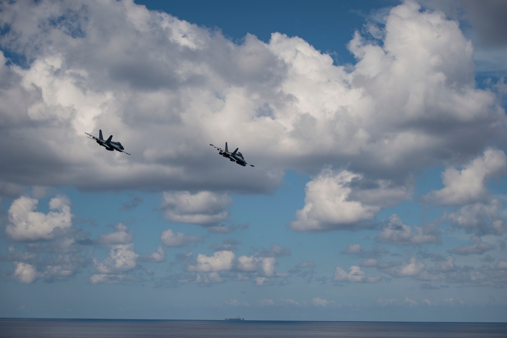 F/A-18 Super Hornets Fly By the USS San Jacinto