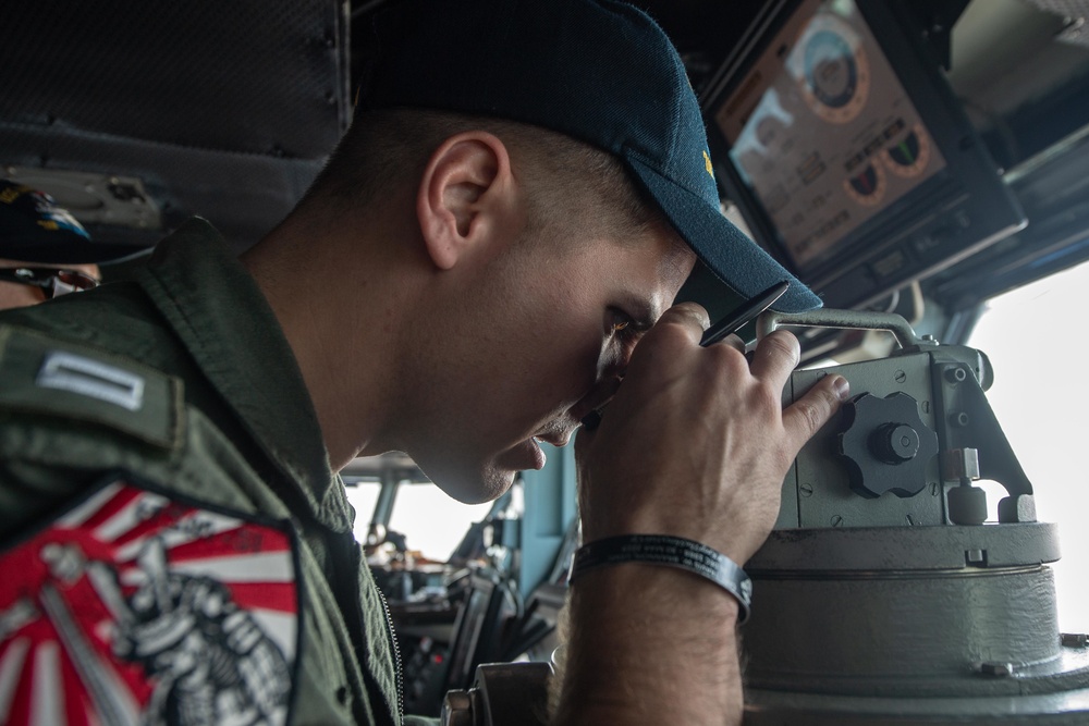 U.S. Sailor shoots a bearing