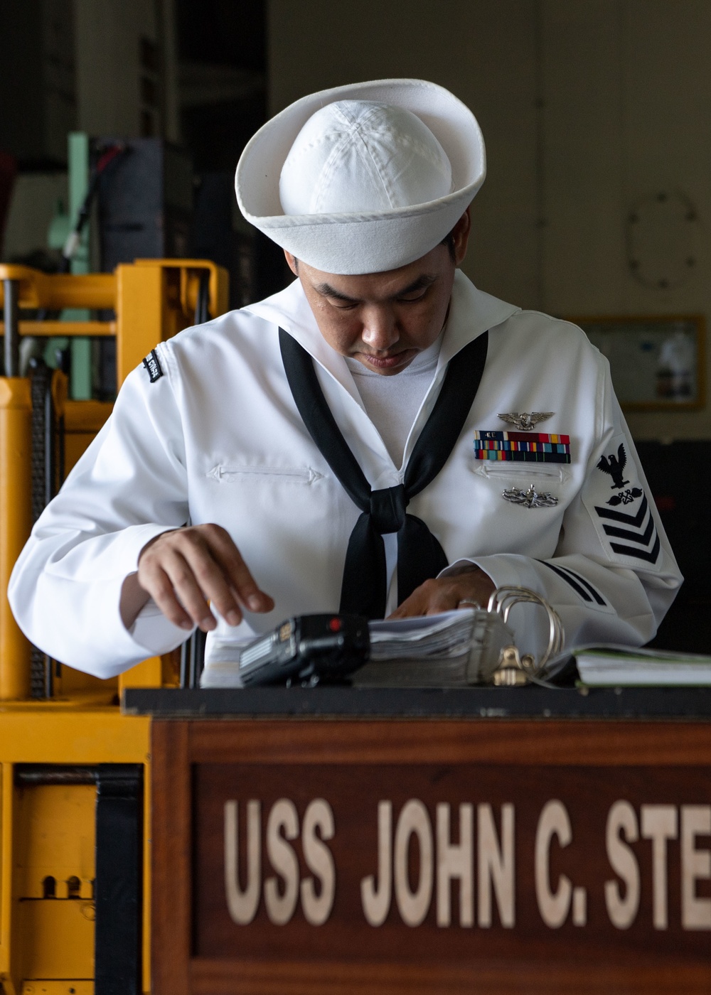 U.S. Sailor prepares to stand watch