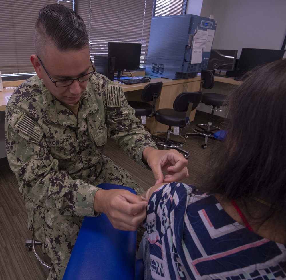 Hospital Corpsman Administers Flu Shots