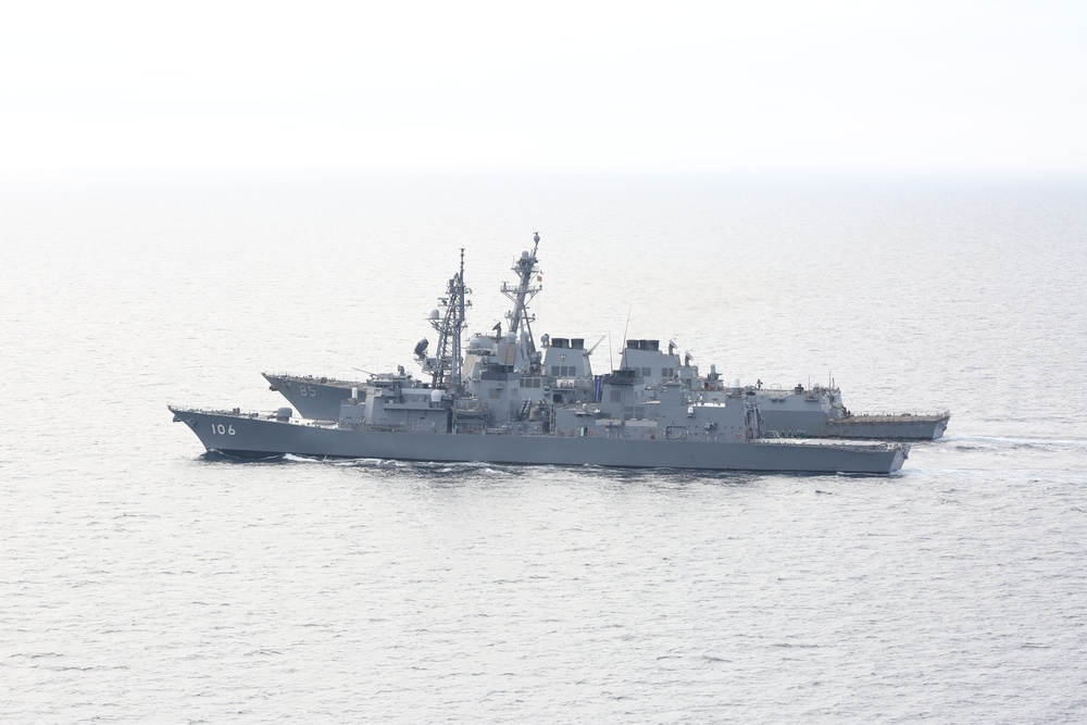 USS McCampbell steams with JMSDF and Indian Navy ships during Malabar 2019