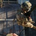 Spartan paratroopers prepare for Fast-Rope insertion