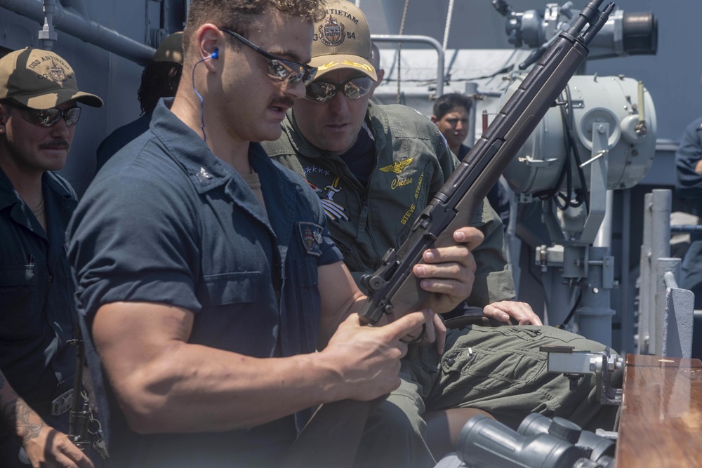 Helicopter Maritime Strike Squadron 77 (HSM 77) commanding officer trains with M1 Garand rifle