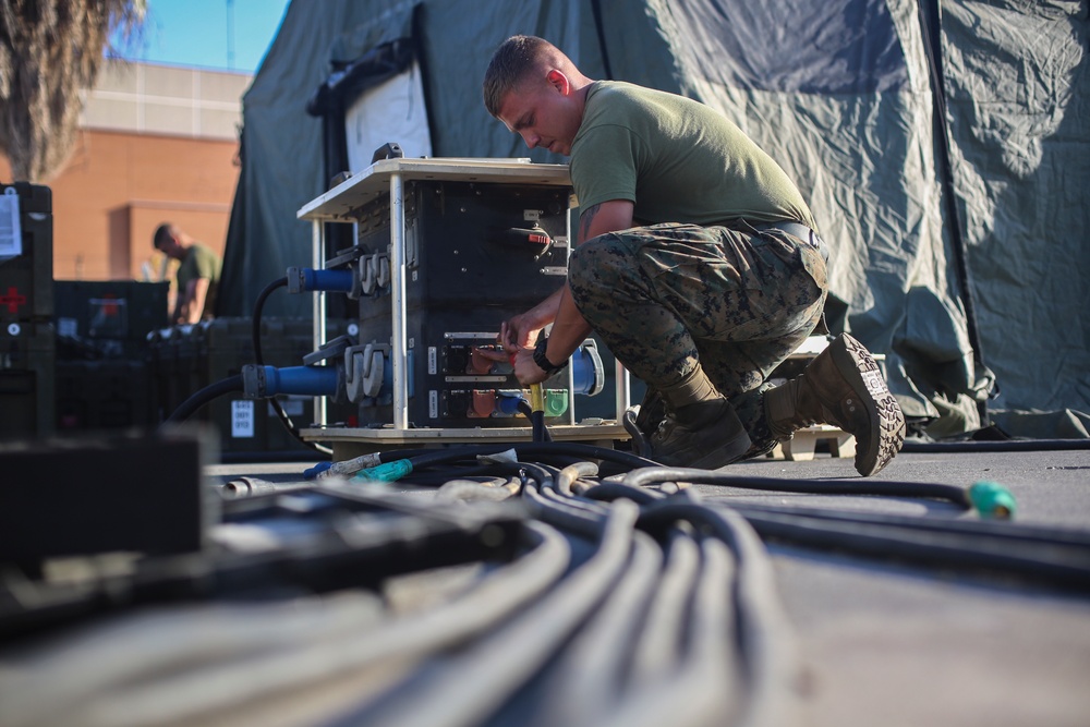 U.S. Navy Sailors Disassemble a FRSS/STP