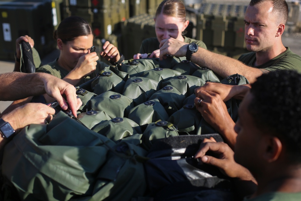 U.S. Navy Sailors Disassemble a FRSS/STP