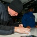 USS Normandy Sailor Makes Deck Log Entry