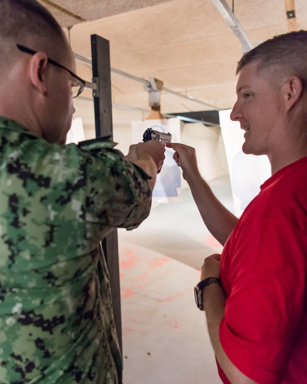 191001-N-TE695-0001 NEWPORT, R.I. (Oct. 1, 2019) — Navy Officer Candidate School shoots M9 pistol qualification