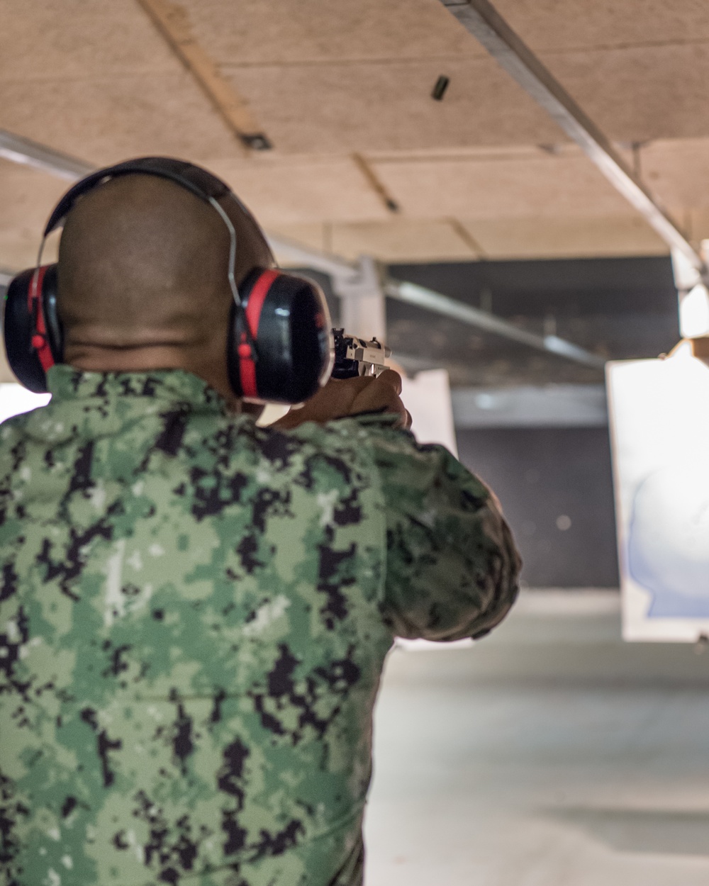 191001-N-TE695-0003 NEWPORT, R.I. (Oct. 1, 2019) — Navy Officer Candidate School shoots M9 pistol qualification