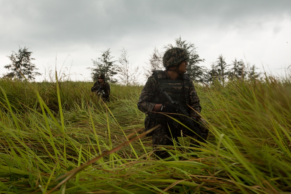 U.S. Marines, Sailors with 3rd Marine Division and the MAF conduct an amphibious assault