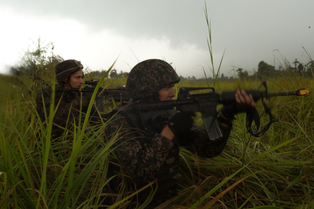 U.S. Marines, Sailors with 3rd Marine Division and the MAF conduct an amphibious assault