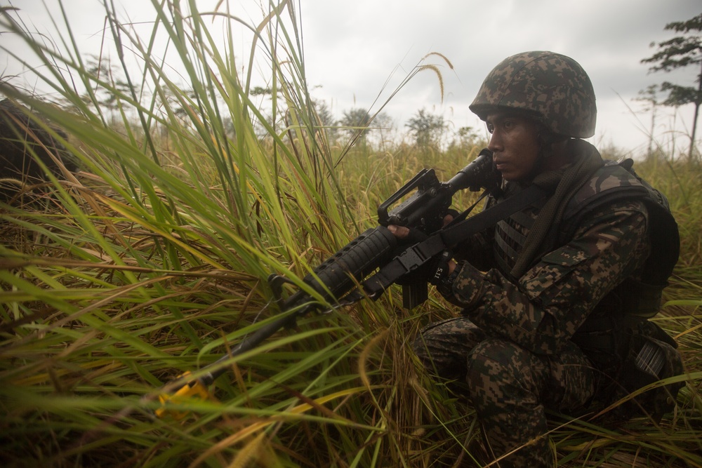 U.S. Marines, Sailors with 3rd Marine Division and the MAF conduct an amphibious assault