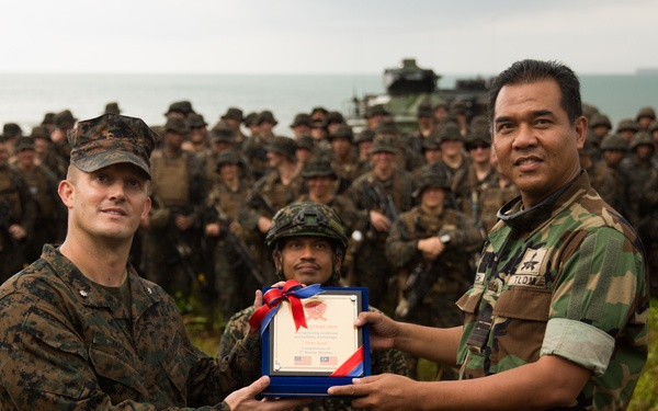 U.S. Marines, Sailors with 3rd Marine Division and the MAF conduct an amphibious assault