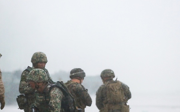 U.S. Marines, Sailors with 3rd Marine Division and the MAF conduct an amphibious assault