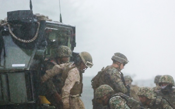 U.S. Marines, Sailors with 3rd Marine Division and the MAF conduct an amphibious assault