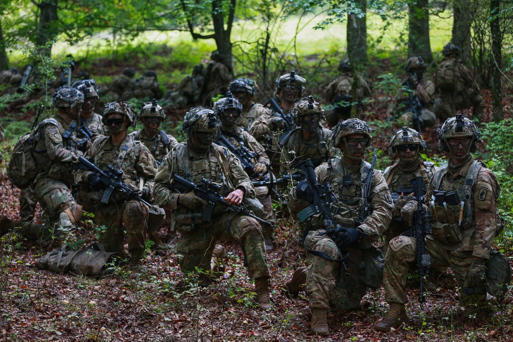 U.S. Soldiers rally together after a patrol during Saber Junction 19