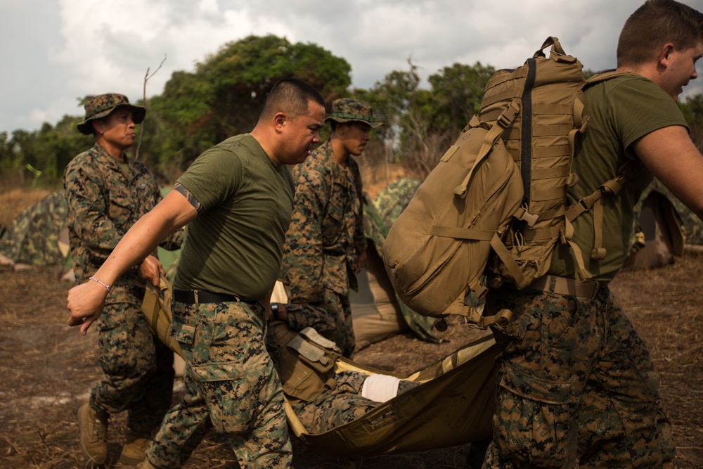 U.S. Marines, Sailors with 3rd Marine Division and the MAF participate in a Simulated Casualty Evacuation Drill