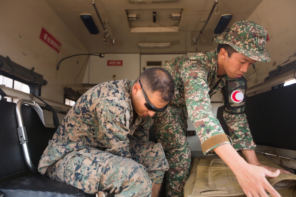 U.S. Marines, Sailors with 3rd Marine Division and the MAF participate in a Simulated Casualty Evacuation Drill