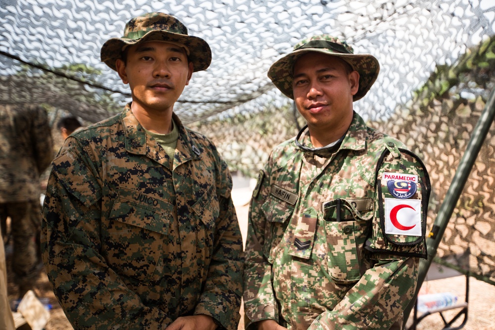 U.S. Marines, Sailors with 3rd Marine Division and the MAF participate in a Simulated Casualty Evacuation Drill