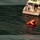 Coast Guard rescues three people from a vessel on fire near Panama City, Florida