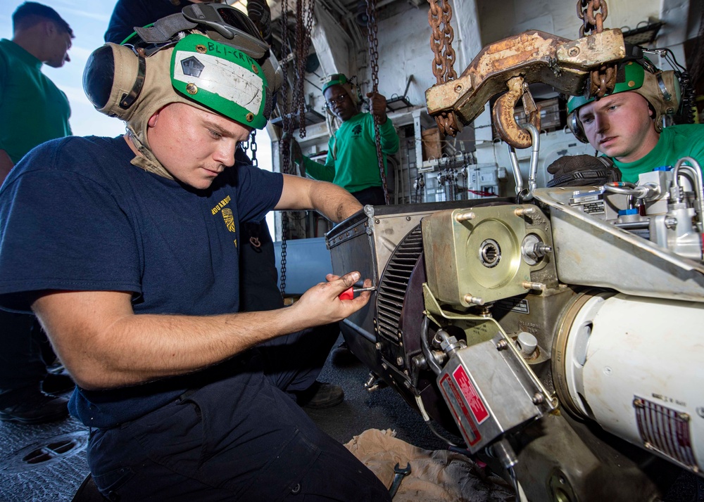 USS Normandy Sailor Removes Heat Shield From APU